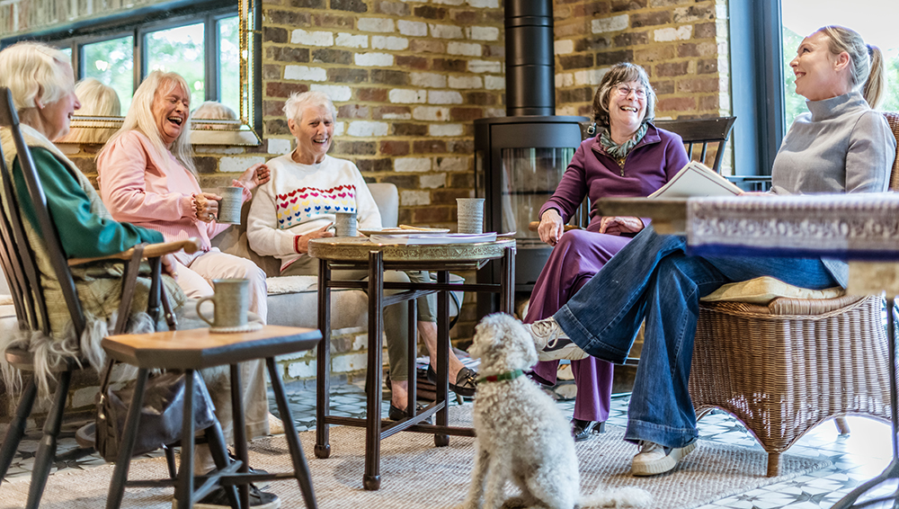 Dementia day care - Tapestry Day Club - chatting together over a coffee